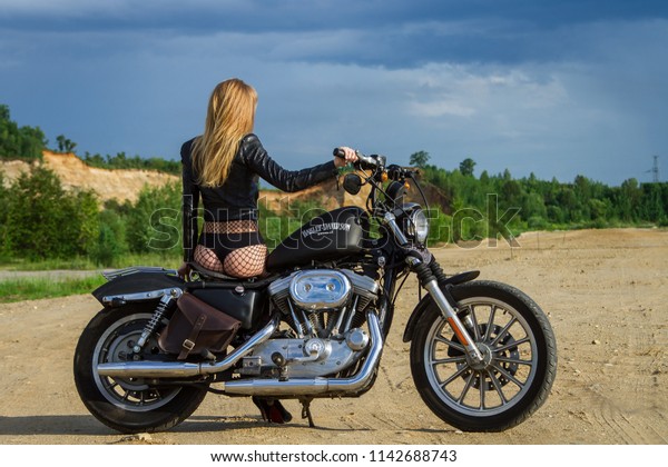 girl sitting on bike