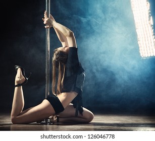 Young Sexy Pole Dance Woman, Dark Background