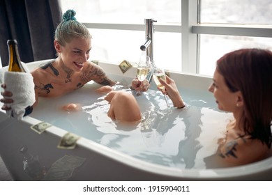 Sexy lesbians get hot in the tub