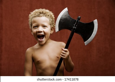 Young Shirtless Boy With A Toy Hatchet