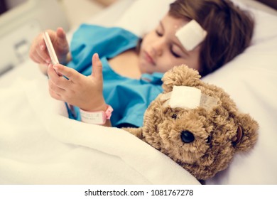 Young sick girl is staying at the hospital - Shutterstock ID 1081767278