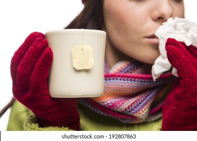 Young Sick Woman with Tissue Holding Cup with Blank Tea Bag Hanging.