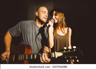 Young Singers Couple Is Making A Duet In The Studio.