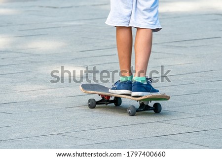 Similar – Image, Stock Photo teenager practicing with skateboard at sunrise city