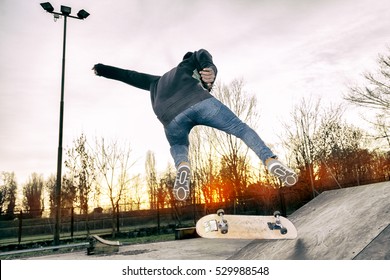 Young Skateboarder Jumping On Ramp Outdoor Stock Photo 529988548 ...