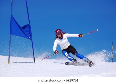 Young Ski Racer Doing Downhill Slalom