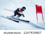 young skier in action in slalom ski competition slalom downhill