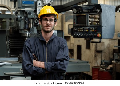 Young Skillful Factory Worker Or Engineer Close Up Portrait In Factory . Industry And Engineering Concept .