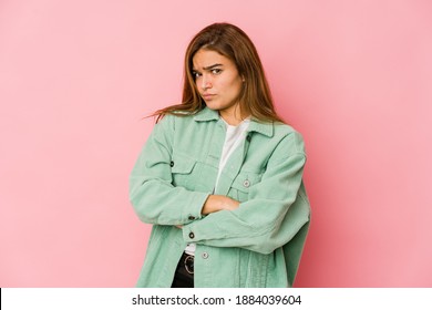 Young Skinny Caucasian Teenager Girl Unhappy Looking In Camera With Sarcastic Expression.