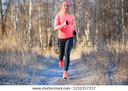 Similar – Blick auf den älteren Mann, der durch den Park joggt.