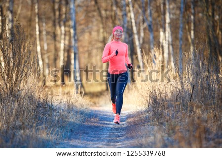 Similar – Blick auf den älteren Mann, der durch den Park joggt.