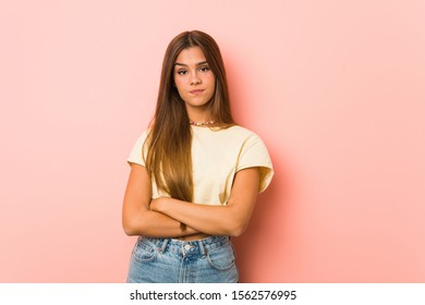 Young Slim Woman Unhappy Looking In Camera With Sarcastic Expression.