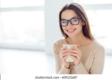 Young Smart Successful Woman In Glasses Having Break, Holding Cup And Drink Coffe.