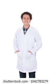 A young smiley doctor, putting hands in pocket, isolated on a white background.