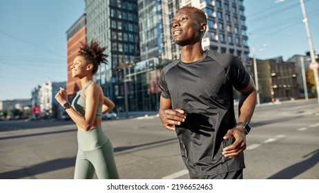 Young Smiling Black Sports Couple Running Stock Photo 2196652463 ...