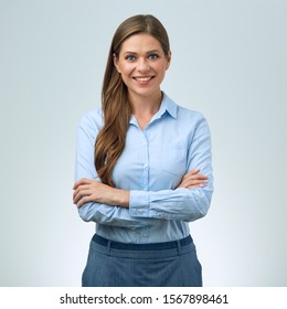 Young Smiling Business Woman In Blue Shirt Standing With Crossed Arms. Isolated Female Portrait.