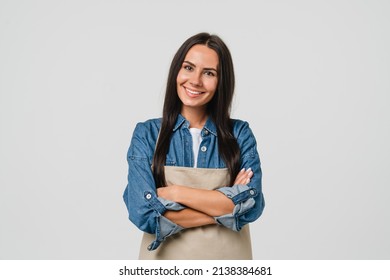 Young Smiling Caucasian Female Barista Bar Tender Coffee Maker Woman In Apron Selling Coffee Hot Beverage Tea With Arms Crossed Isolated In White Background.