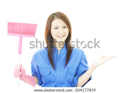 Young smiling cleaner woman.