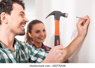 51 Couple Hammering Nail Into Wall Images, Stock Photos & Vectors |  Shutterstock