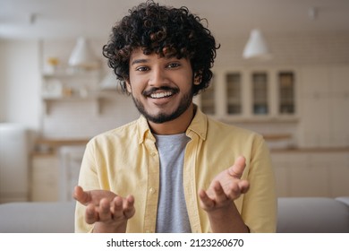 Young Smiling Indian Man Having Video Call. Handsome Young Freelancer Communication Online Working From Home, Video Conference Concept. Successful Asian Influencer Recording Video Talking To Camera