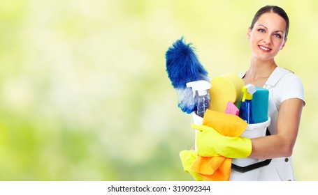 Young Smiling Maid. House Cleaning Service Concept.