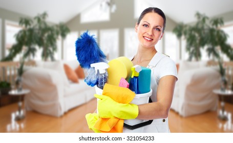 Young Smiling Maid. House Cleaning Service Concept.