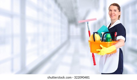 Young Smiling Maid. House Cleaning Service Concept.