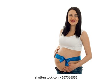 young smiling pregnant girl and Blue Ribbon the tummy