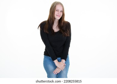 Young Smiling Shy Woman Blonde Looks In Camera Arms Crossed 