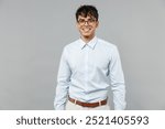 Young smiling successful employee business latin man corporate lawyer 20s wear classic white shirt glasses work in office isolated on grey color background studio portrait. Career achievement concept