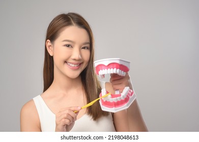 Young Smiling Woman Holding Toothbrush Over Stock Photo 2198048613 ...