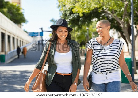 Similar – Image, Stock Photo Two happy and urban lesbian girlfriends