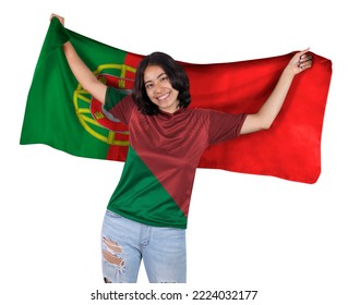 Young soccer fanatic woman with red and green  sports jersey and flag to Portugal in his hands, happy for the victory of his favorite team. - Powered by Shutterstock