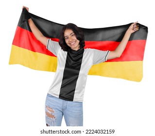 Young soccer fanatic woman with white and black  sports jersey and flag to Germany in his hands, happy for the victory of his favorite team. - Powered by Shutterstock