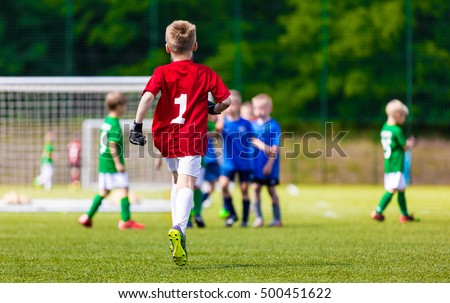 Young Soccer Goalie Goalkeeper. Young Boy Soccer Goalie. Youth Sports Soccer Football Background