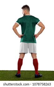 Young Soccer Player Back On Grass With Green Shirt  On White Background