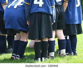 Young Soccer Team In A Huddle