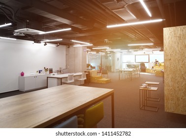 young software developers enjoying break in relaxation area of Modern sunny bright Open Plan Office - Powered by Shutterstock - Get 15% off with code: PIKWIZARD15