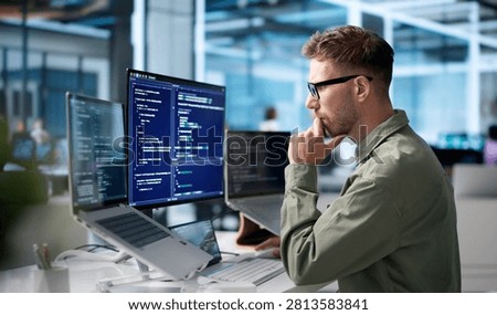 Young Software Engineer Coding On Laptop To Build Secure Business Platform.