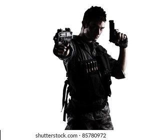 young soldier shooting with a pistol on a white background