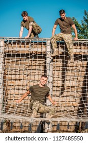 young soldiers practicing during obstacle run on range - Shutterstock ID 1127485550