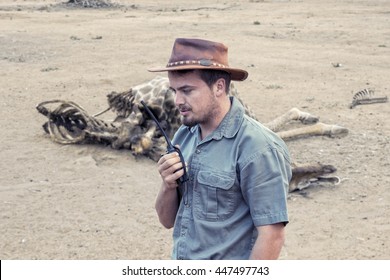 Young South African Wildlife Ranger With Walkie Talkie Sends Information About Found Dead Body Of A Giraffe To The Headquarter.