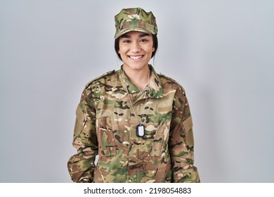 Young South Asian Woman Wearing Camouflage Army Uniform With A Happy And Cool Smile On Face. Lucky Person. 