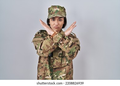 Young South Asian Woman Wearing Camouflage Army Uniform Rejection Expression Crossing Arms Doing Negative Sign, Angry Face 