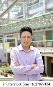 Young South East Asian Man Business Office Outdoor Stand Look At Camera Confident Happy