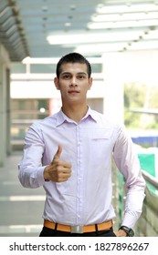 Young South East Asian Middle Eastern Man Business Office Outdoor Stand Look At Camera Thumbs Up