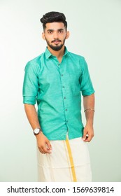 Young South Indian Man In Traditional Dress, Dhoti And Shirt