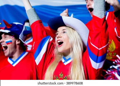 Young Sports Fans In Stadium