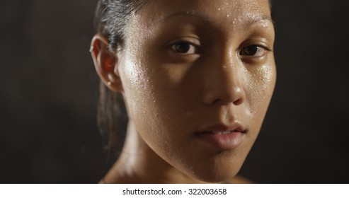 Young Sports Woman's Face Sweating From Exercise