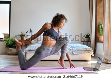 woman doing yoga by swimming pool. Yoga and mindfulness